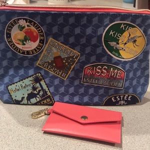 Estée Lauder Blue Travel pattern make-up bag w/Pink coin purse attached.